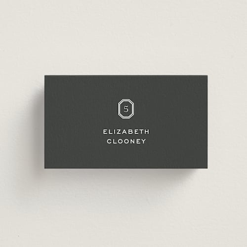 This is a charcoal wedding place cards with standard by Megan Davis called upper east printing on signature in placecard