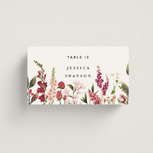 This is a magenta wedding place cards with standard by Susan Moyal called lush printing on signature in placecard