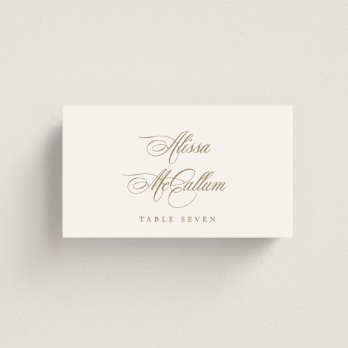 This is a champagne wedding place cards with standard by Jennifer Postorino called empire printing on signature in placecard
