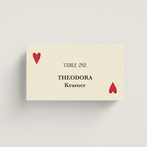 This is a champagne wedding place cards with standard by Helena Vitto called red hearts printing on signature in placecard