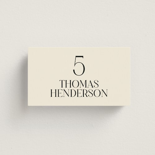 This is a cream wedding place cards with standard by Baumbirdy called floral emblem printing on signature in placecard