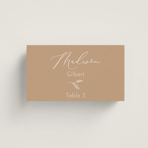 This is a buttercream wedding place cards with standard by Claudia Orengo called belle rose printing on signature in placecard