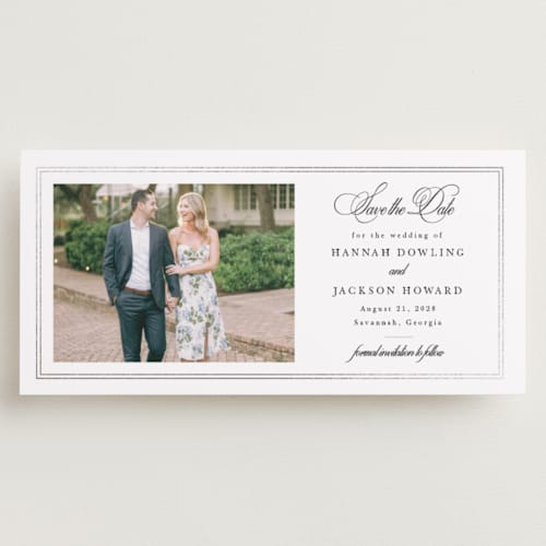 This is a snow foil stamped save the date cards with foil pressed by Sarah Brown called traditionally printing on recycled smooth signature in tall