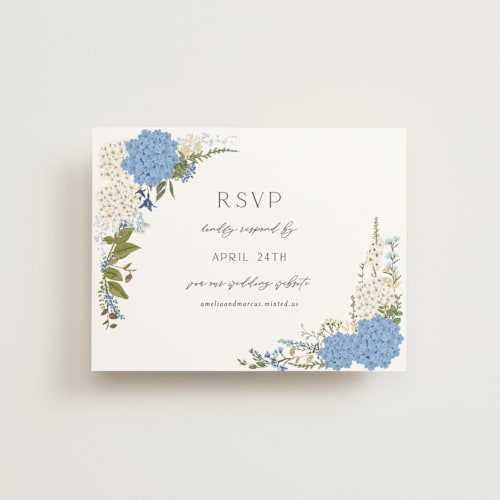 This is a coastal rsvp cards with foil pressed by Susan Moyal called garden whisper printing on signature in standard