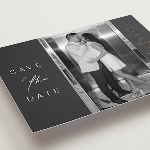 This is a midnight foil stamped save the date cards with foil pressed by Angela Thompson called elegant type printing on recycled smooth signature in standard