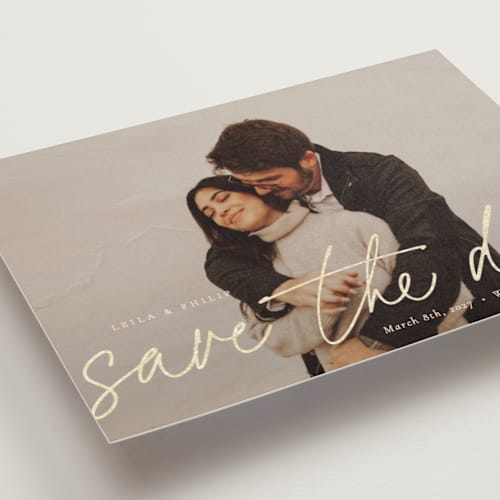 This is a blush foil stamped save the date cards with foil pressed by Sara Hicks Malone called scripted printing on recycled smooth signature in standard