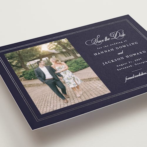This is a navy foil stamped save the date cards with foil pressed by Sarah Brown called traditionally printing on recycled smooth signature in standard