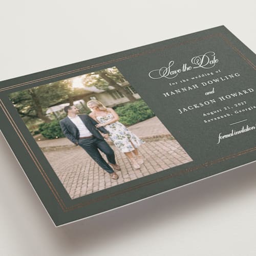 This is a hunter foil stamped save the date cards with foil pressed by Sarah Brown called traditionally printing on recycled smooth signature in standard