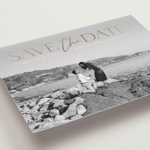 This is a moonstone foil stamped save the date cards with foil pressed by Olivia Raufman called breathtaking printing on recycled smooth signature in standard