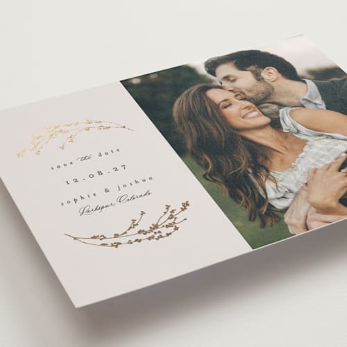 This is a cream foil stamped save the date cards with foil pressed by Gwen Bedat called foliage nest printing on recycled smooth signature in standard