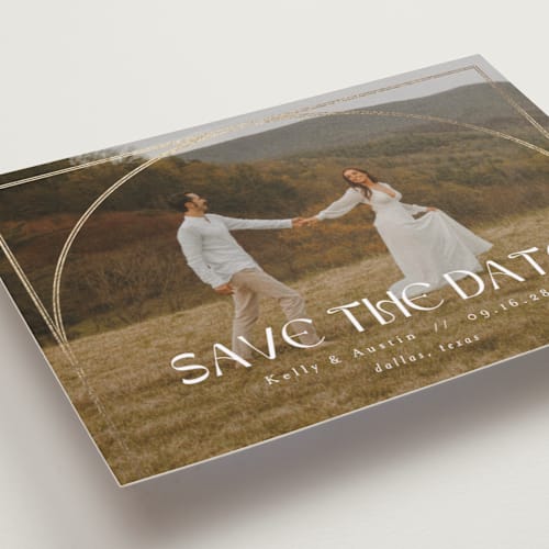 This is a snow foil stamped save the date cards with foil pressed by AK Graphics called folklore printing on recycled smooth signature in standard