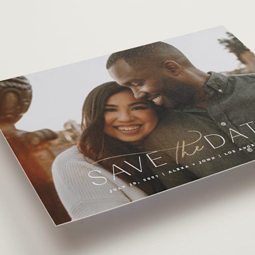 This is a powder foil stamped save the date cards with foil pressed by Everett Paper Goods called serene printing on recycled smooth signature in standard