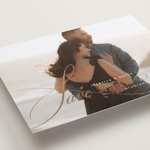 This is a quartz foil stamped save the date cards with foil pressed by Design Lotus called sway printing on recycled smooth signature in standard