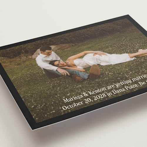 This is a coal save the date with standard by Becky Nimoy called black border printing on recycled smooth signature in standard