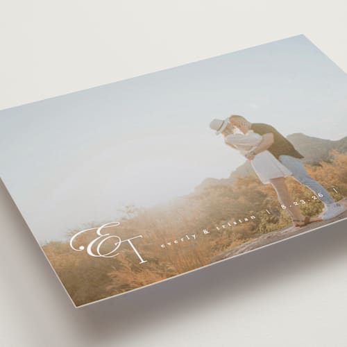 This is a quartz save the date with standard by Kristie Kern called whispered printing on recycled smooth signature in standard