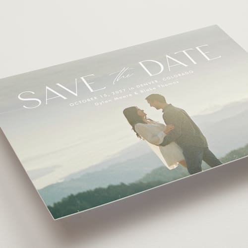 This is a cloud save the date with standard by Kate Ahn called monterosso printing on recycled smooth signature in standard