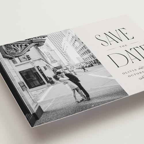 This is a dove save the date with standard by Robert and Stella called pierre printing on recycled smooth signature in standard