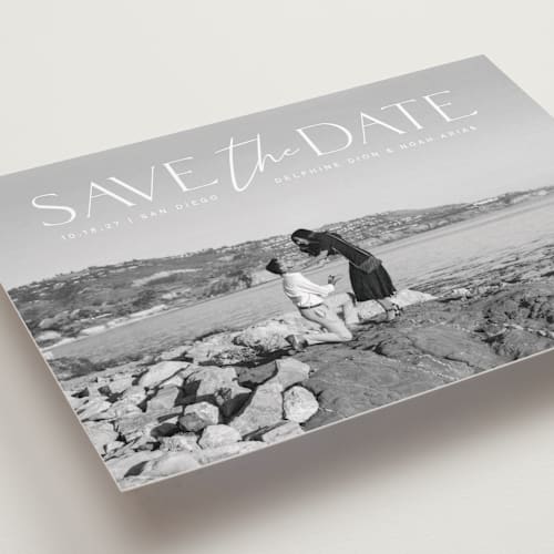 This is a moonstone save the date with standard by Olivia Raufman called breathtaking printing on recycled smooth signature in standard