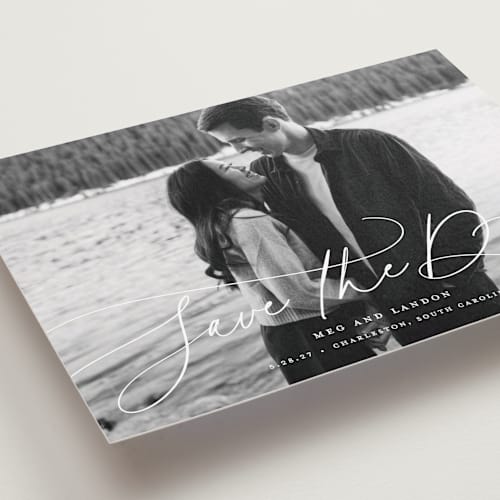This is a snowfall save the date with standard by Lauren Chism called subtle rise printing on recycled smooth signature in standard