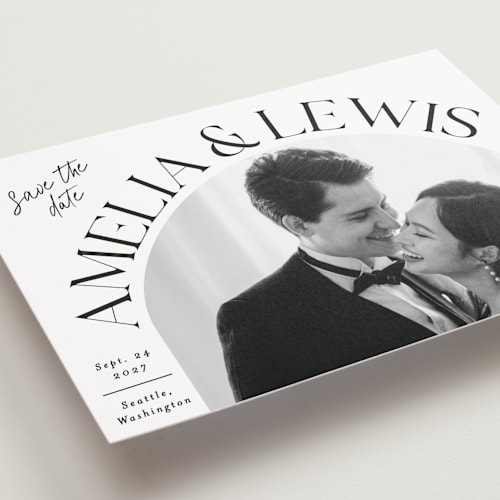 This is a ivory save the date with standard by Alethea and Ruth called side curve printing on recycled smooth signature in standard