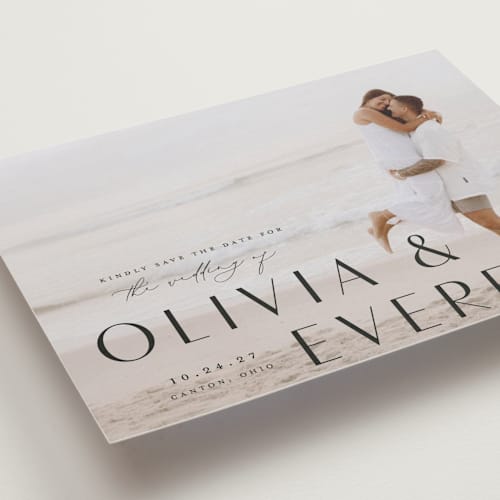 This is a onyx save the date with standard by Emily Betts called modern classic names printing on recycled smooth signature in standard