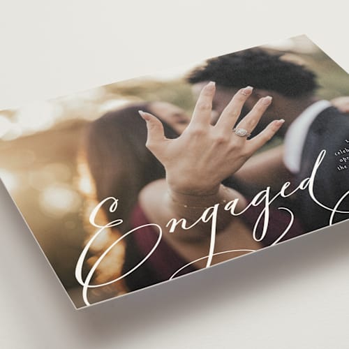 This is a snow engagement party invitations with standard by Lori Wemple called engaged printing on signature in standard