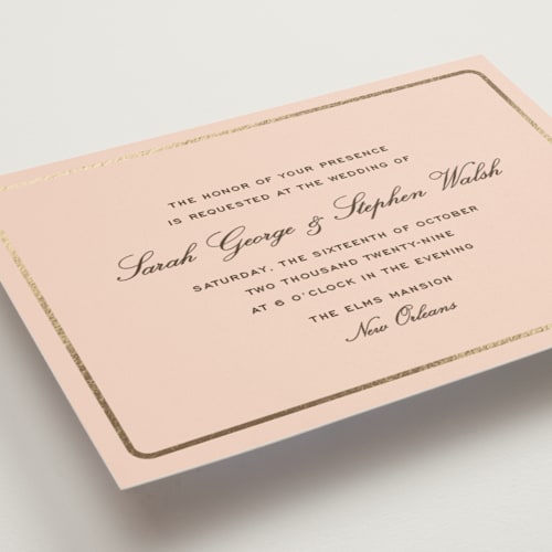 This is a peach foil stamped wedding invitations with foil pressed by Megan Davis called aperitif printing on signature in standard