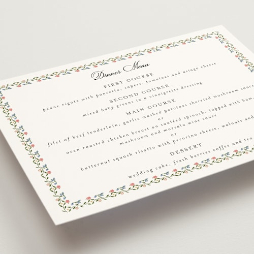 This is a blush menu cards with standard by Susan Moyal called monogramed printing on signature in standard