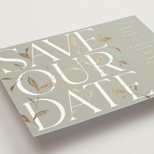 This is a spring foil stamped save the date cards with foil pressed by Erin L. Wilson called secret garden printing on signature in standard