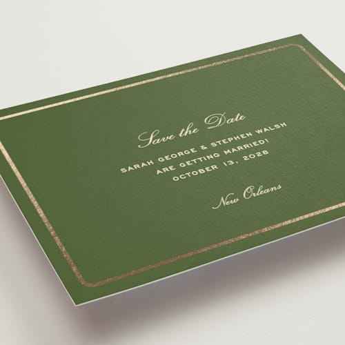 This is a olive foil stamped save the date cards with foil pressed by Megan Davis called aperitif printing on signature in standard