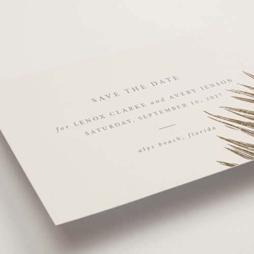 This is a sand foil stamped save the date cards with foil pressed by Melinda Denison called gilded palm printing on signature in standard