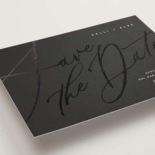 This is a noir foil stamped save the date cards with foil pressed by Eric Clegg called brush script printing on signature in standard