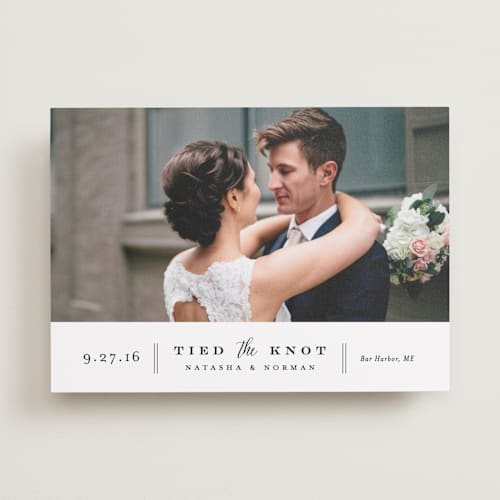 This is a vanilla wedding announcements with standard by Jennifer Wick called bottom line printing on recycled smooth signature in standard