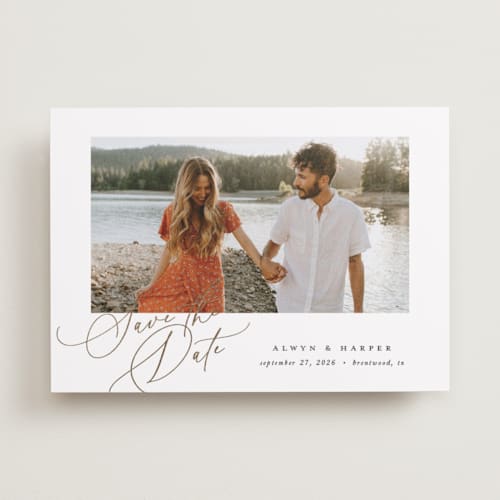 This is a pearl foil stamped save the date cards with foil pressed by Melanie Kosuge called modern script printing on recycled smooth signature in standard