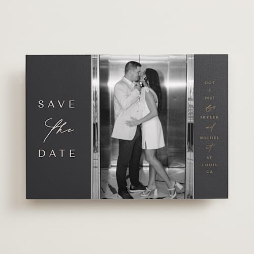 This is a midnight foil stamped save the date cards with foil pressed by Angela Thompson called elegant type printing on recycled smooth signature in standard