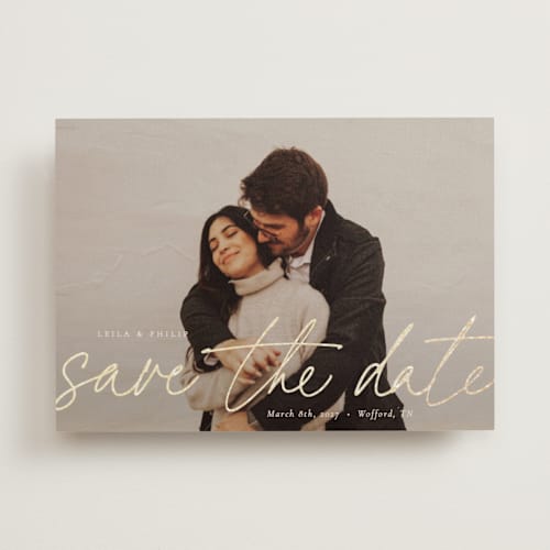 This is a blush foil stamped save the date cards with foil pressed by Sara Hicks Malone called scripted printing on recycled smooth signature in standard