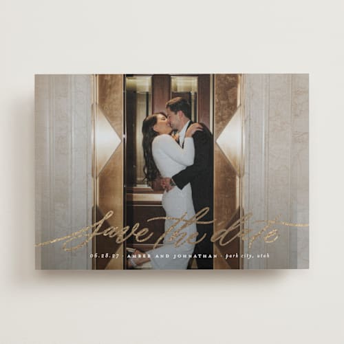 This is a chamomile foil stamped save the date cards with foil pressed by Wildfield Paper Co called daisy printing on recycled smooth signature in standard
