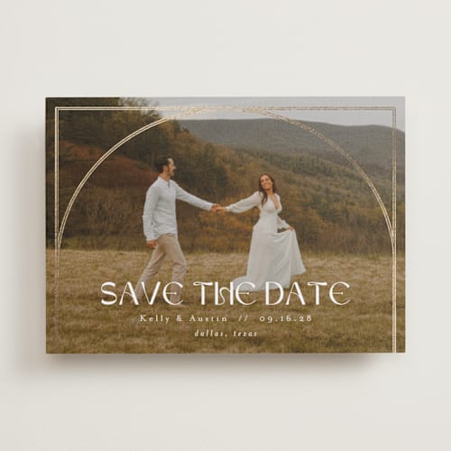 This is a snow foil stamped save the date cards with foil pressed by AK Graphics called folklore printing on recycled smooth signature in standard