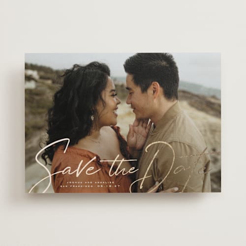 This is a sand foil stamped save the date cards with foil pressed by Wildfield Paper Co called signature printing on recycled smooth signature in standard