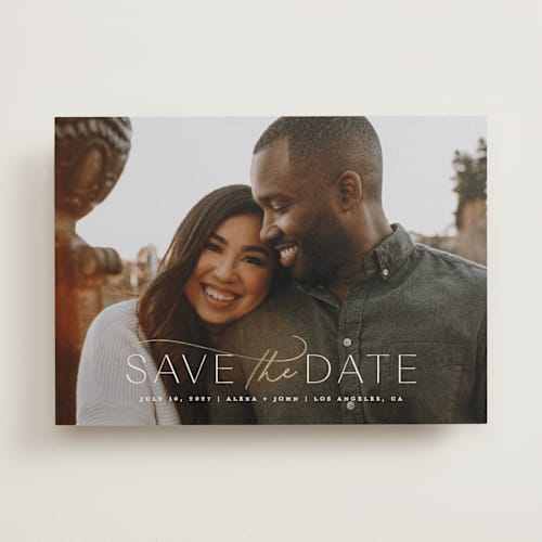 This is a powder foil stamped save the date cards with foil pressed by Everett Paper Goods called serene printing on recycled smooth signature in standard