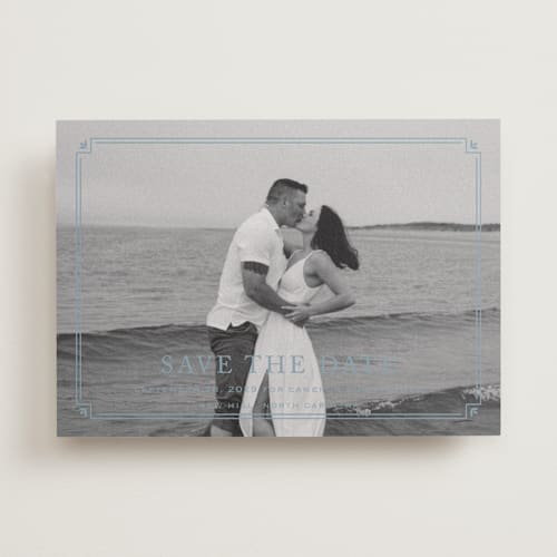 This is a french blue save the date with standard by Carolyn MacLaren called fleur corner printing on recycled smooth signature in standard