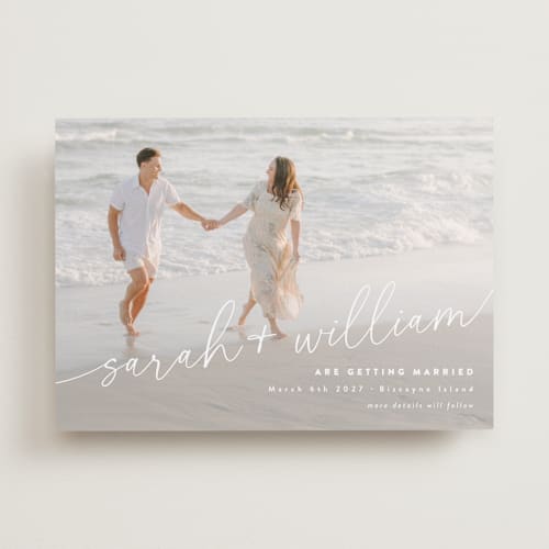 This is a ivory save the date with standard by Jessie Steury called sweet script printing on recycled smooth signature in standard