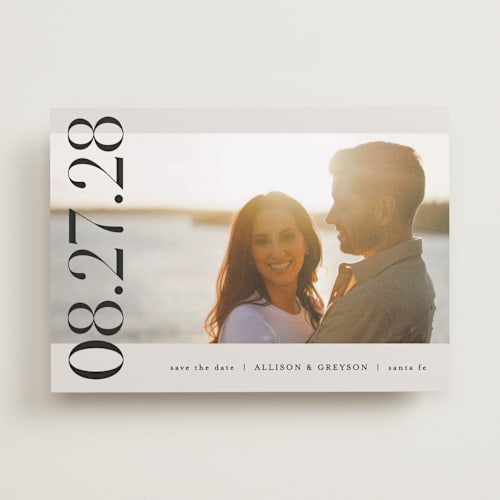 This is a ivory save the date with standard by Pixel and Hank called all stacked up printing on recycled smooth signature in standard
