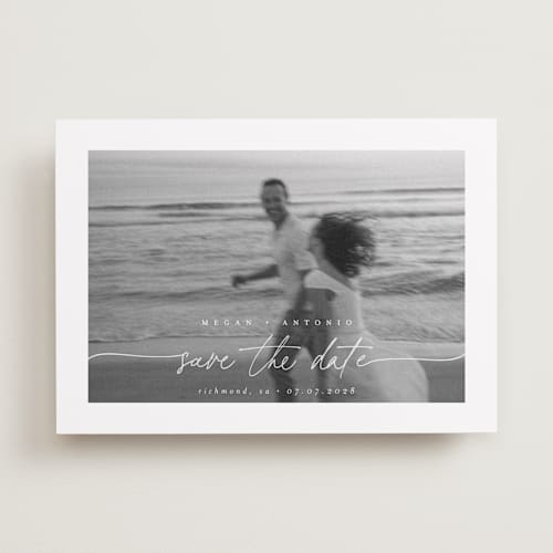 This is a ivory save the date with standard by Pippa Shaw called gaussian printing on recycled smooth signature in standard