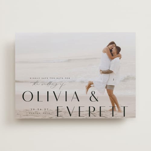 This is a onyx save the date with standard by Emily Betts called modern classic names printing on recycled smooth signature in standard