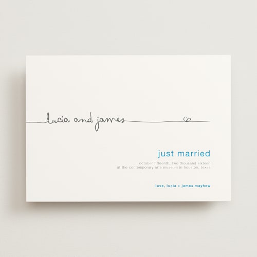 This is a blue wedding announcements with standard by R studio called the happy couple printing on signature in standard