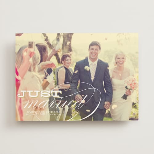 This is a gold wedding announcements with standard by Annie Clark called calligraphy    printing on signature in standard