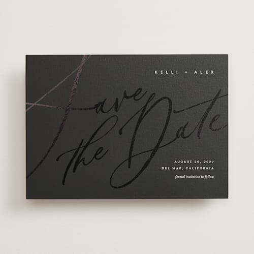 This is a noir foil stamped save the date cards with foil pressed by Eric Clegg called brush script printing on signature in standard