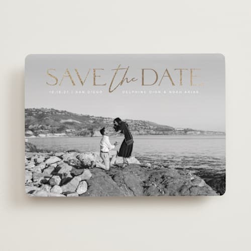 This is a moonstone foil stamped save the date cards with foil pressed by Olivia Raufman called breathtaking printing on recycled smooth signature in standard