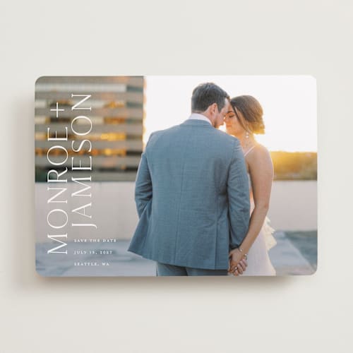 This is a quartz save the date with standard by Angela Garrick called carefree printing on recycled smooth signature in standard